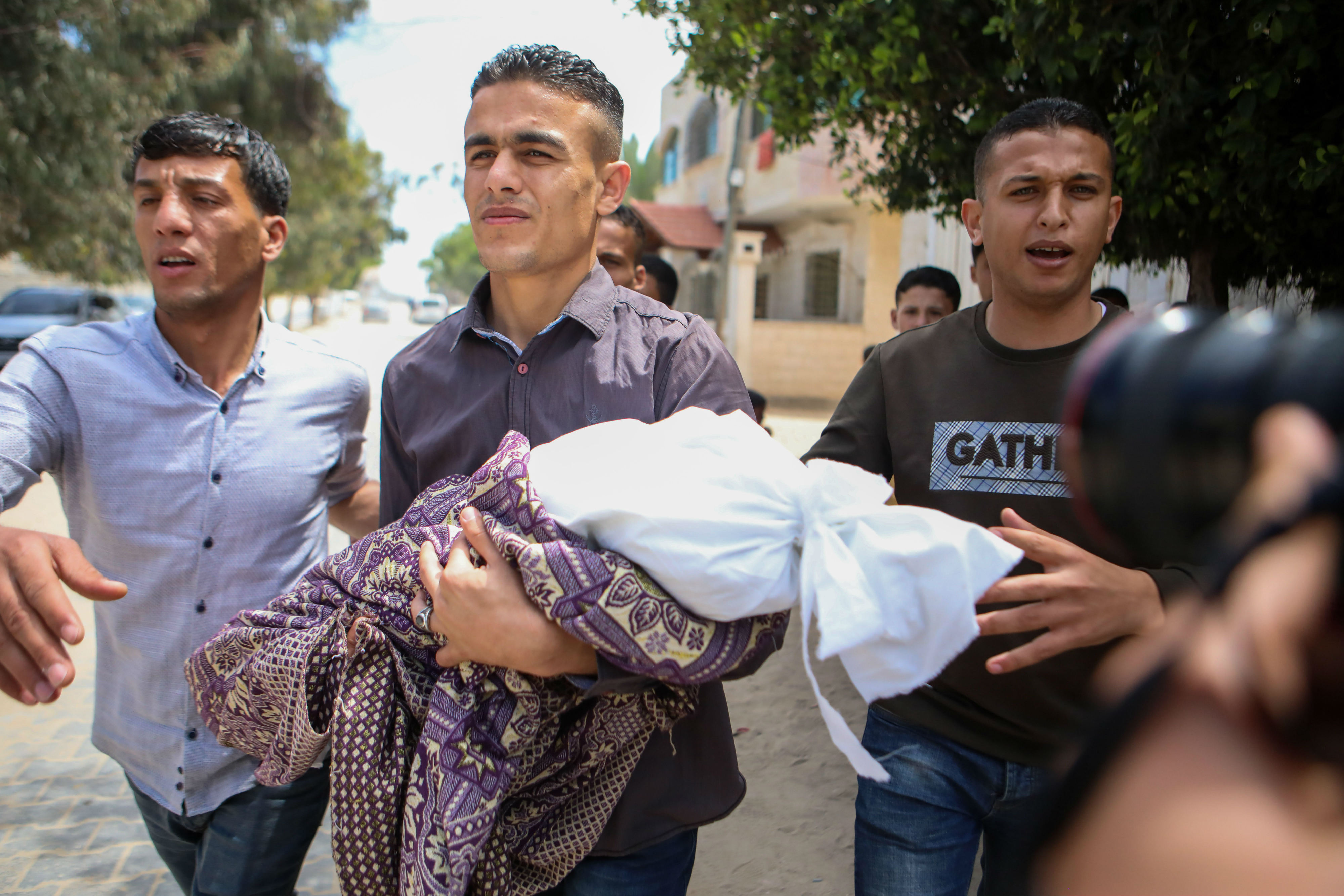 The funeral of 14-month-old Sebba Mahmoud Abu Arar in Gaza's al-Zaitoun (MEE/Mohammed al-Hajjar)