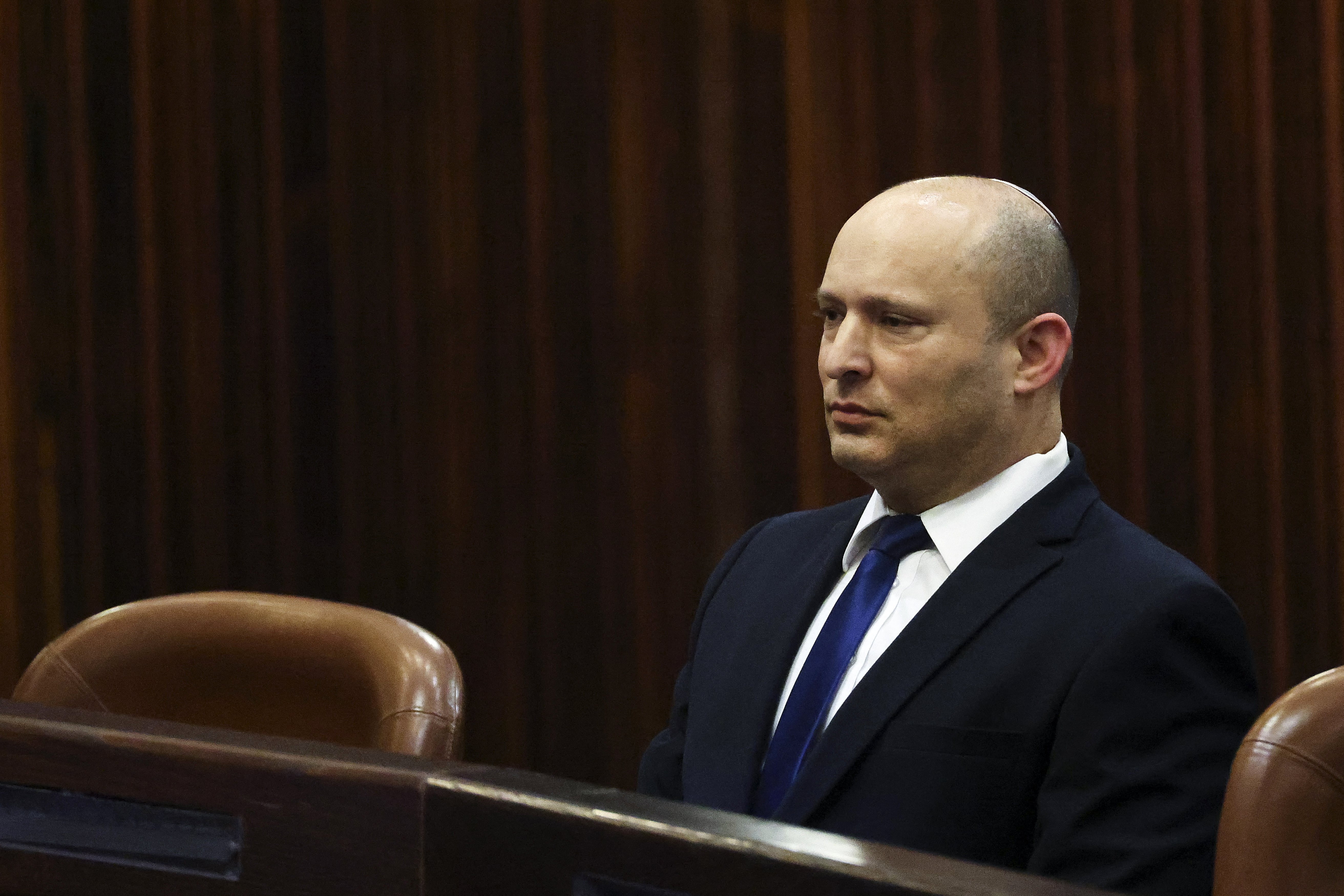 Naftali Bennett, Israeli parliament member from Yamina party, attends a special session of the Knesset, Israel's parliament, in which MPs will elect a new president, in Jerusalem on 2 June, 2021. (AFP)