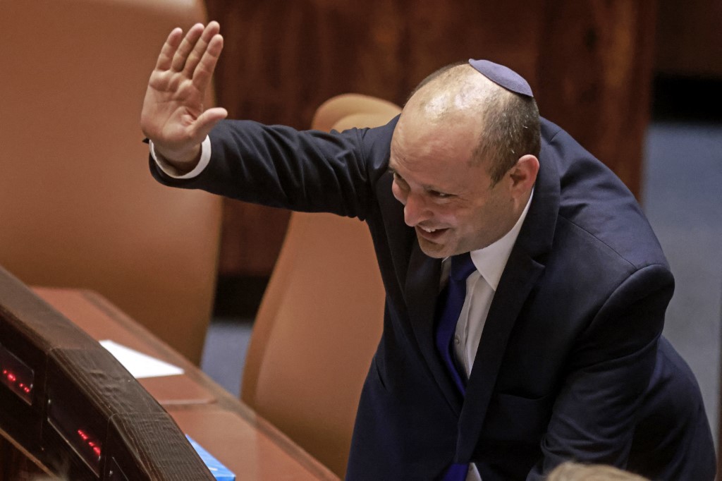 Bennett gestures at the Knesset in Jerusalem on 16 June 2021 (AFP)