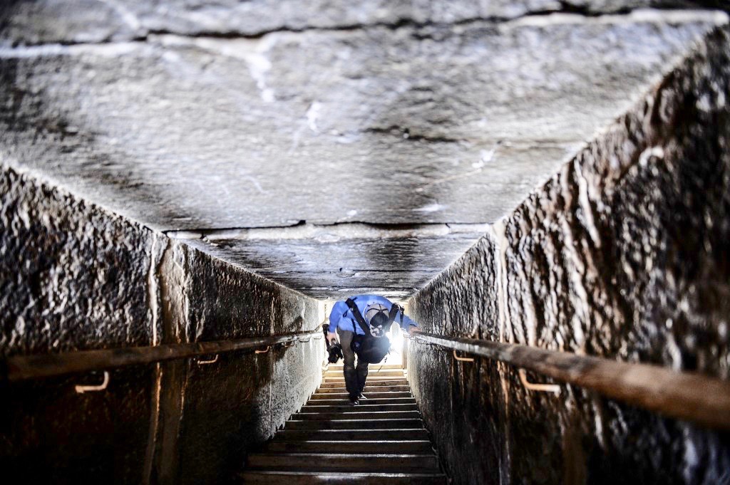 Man walks through passage in Bent Pyramid of King Sneferu on Saturday (AFP)