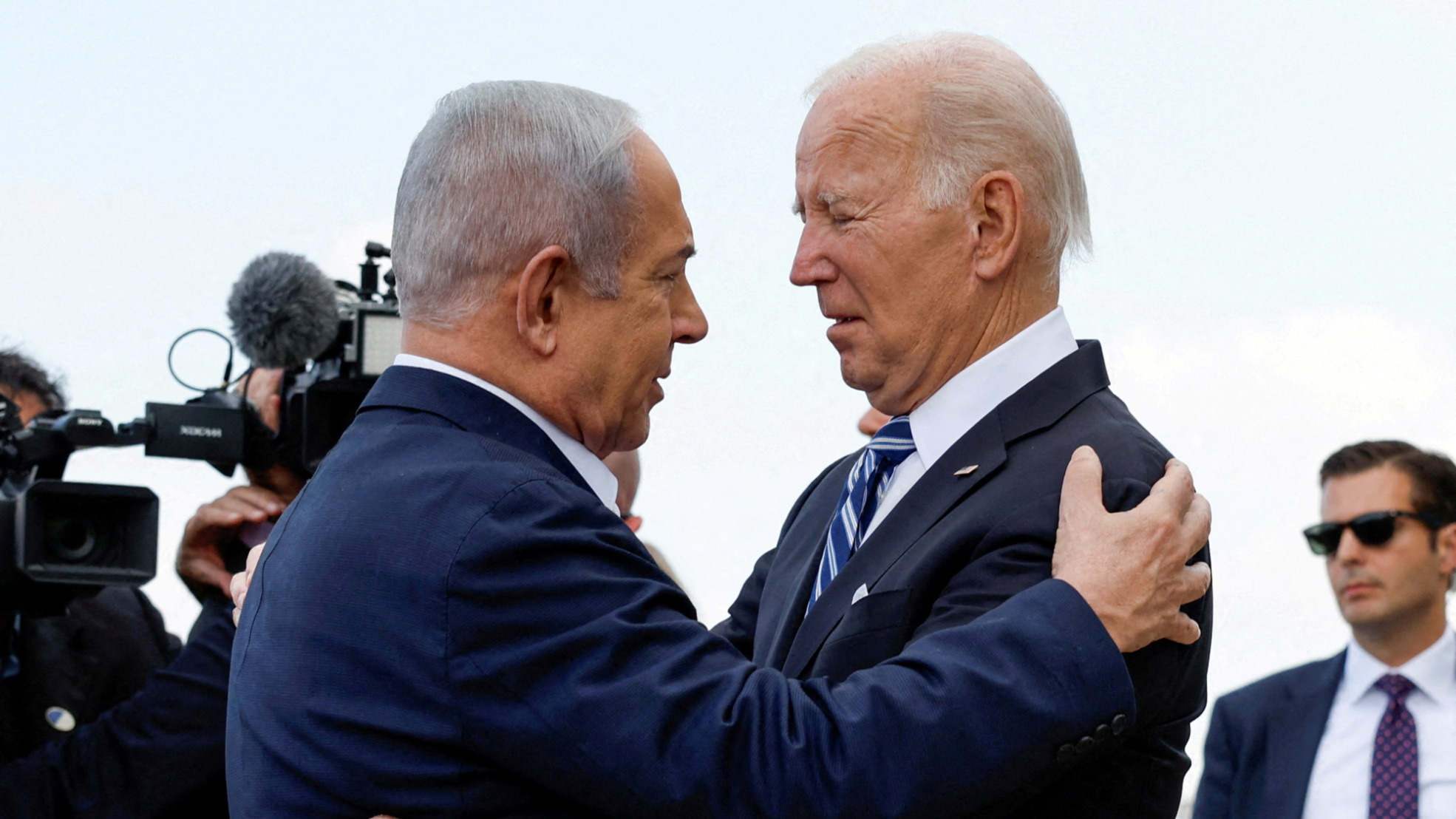 US President Joe Biden is greeted by Israeli Prime Minister Benjamin Netanyahu in Tel Aviv, Israel on 18 October 2023 (Evelyn Hockstein/Reuters)