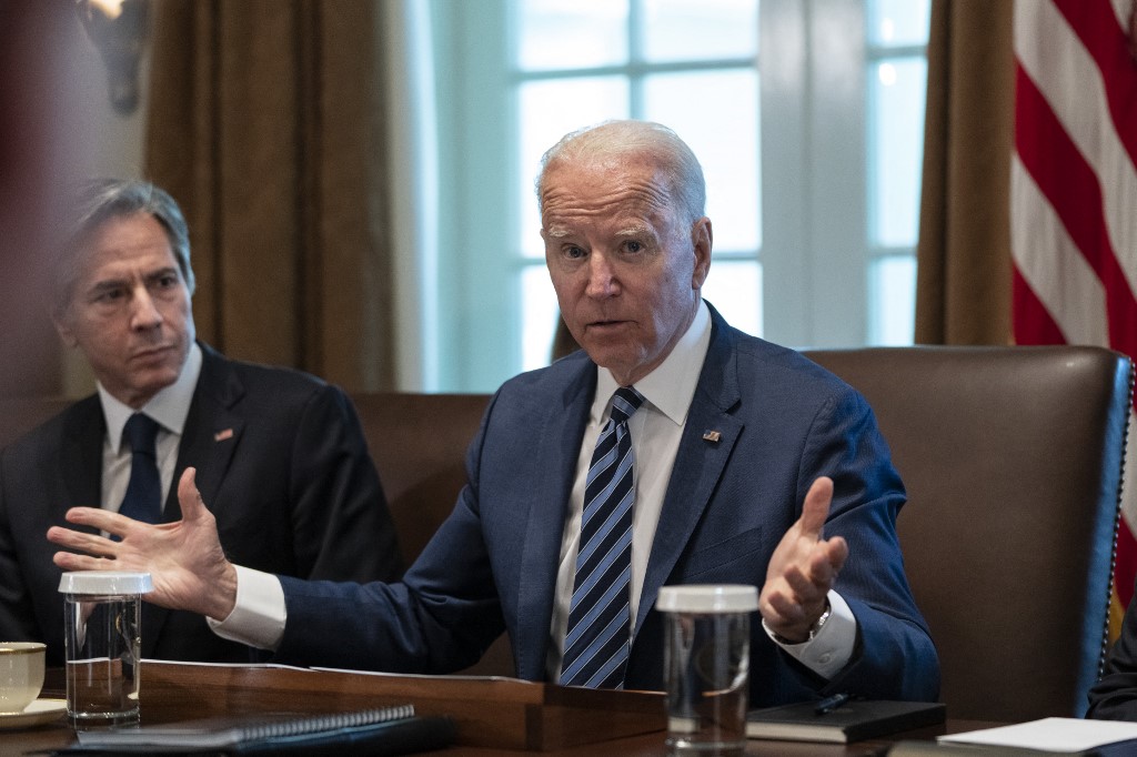 US Secretary of State Antony Blinken looks on as President Joe Biden speaks at the White House on 20 July 2021 (AFP)
