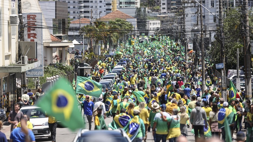 Supporters of Brazilian President Jair Bolsonaro march in Estreito on 2 November 2022 (AFP)