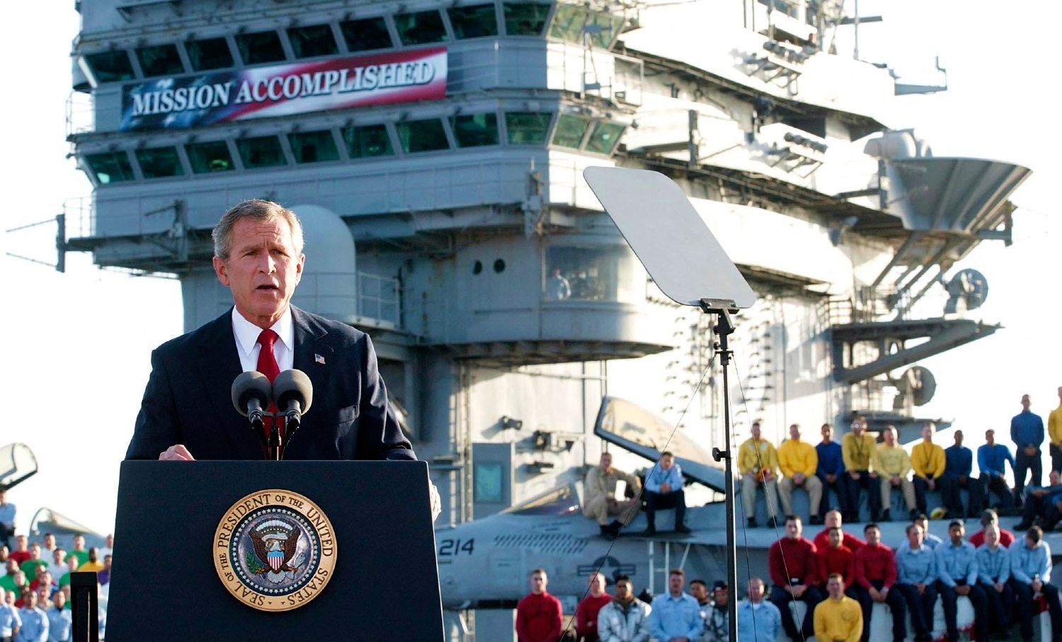 US President George W. Bush addresses the nation aboard the USS Abraham Lincoln, on 1 May 2003 (AFP)