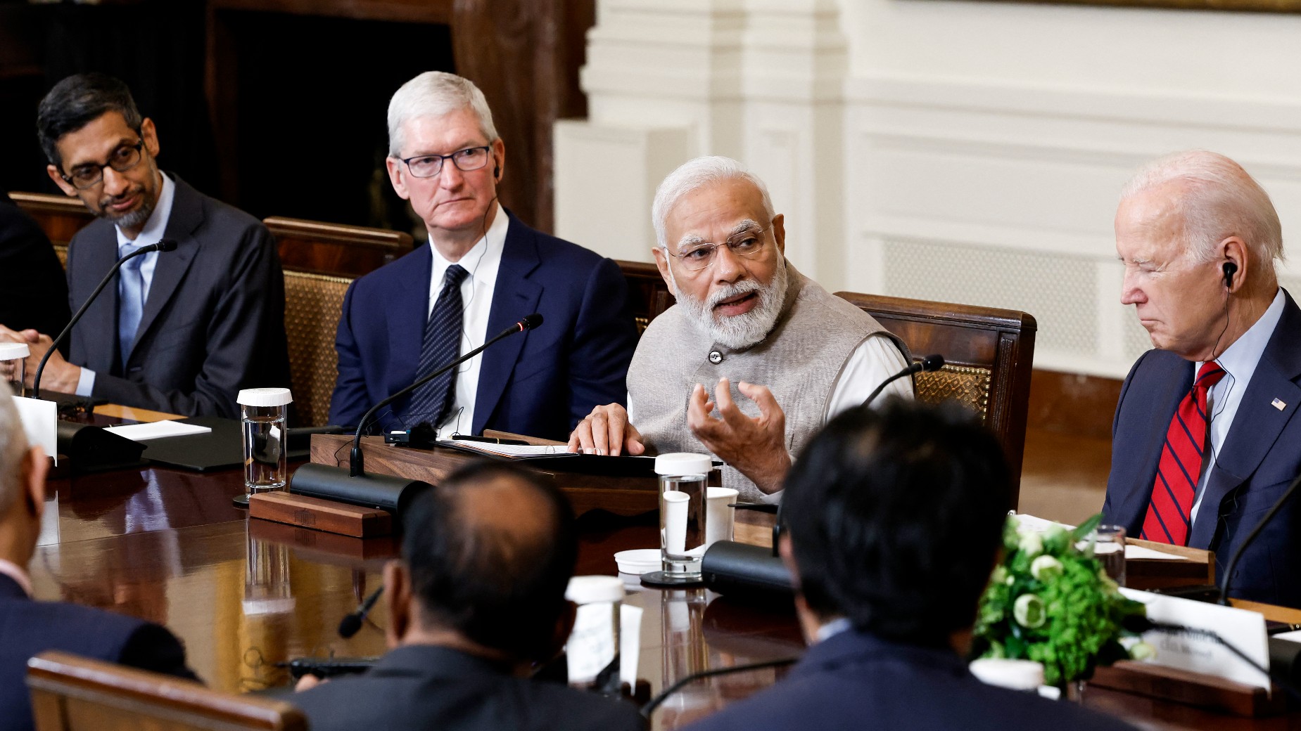 Biden and Modi held the meeting to meet with a range of leaders from the tech and business worlds, including Google CEO Sundar Pichai (L) and Apple CEO Tim Cook (2nd from left) [AFP]
