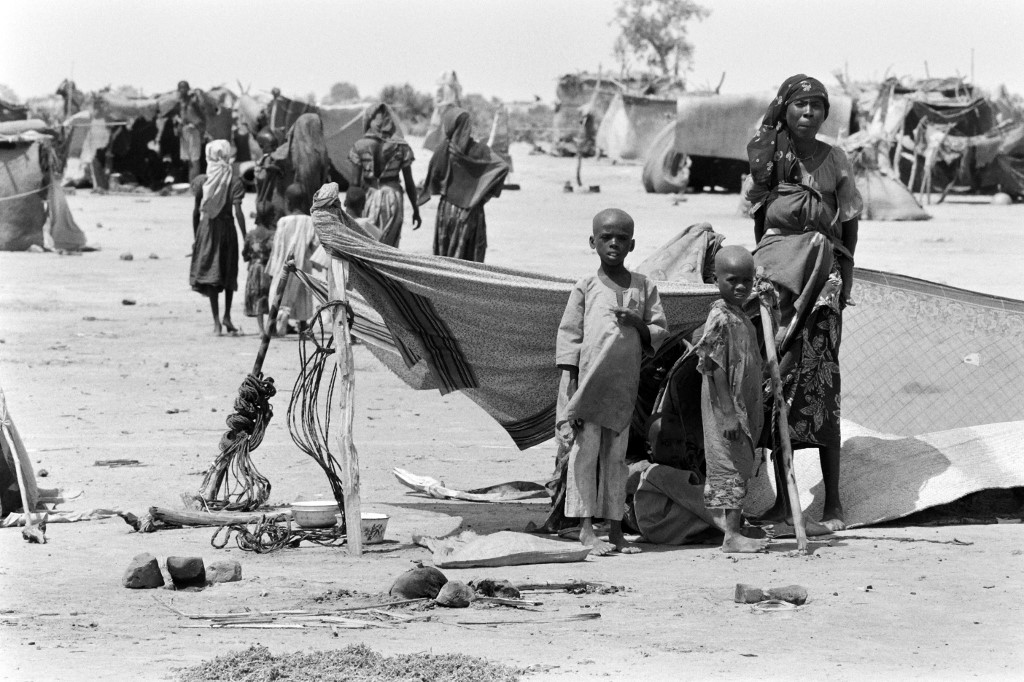 Chadian women and children are pictured at the Ati refugee camp , on October 01, 1984 after being forced to flee their homes due to a famine in consequence of a drought