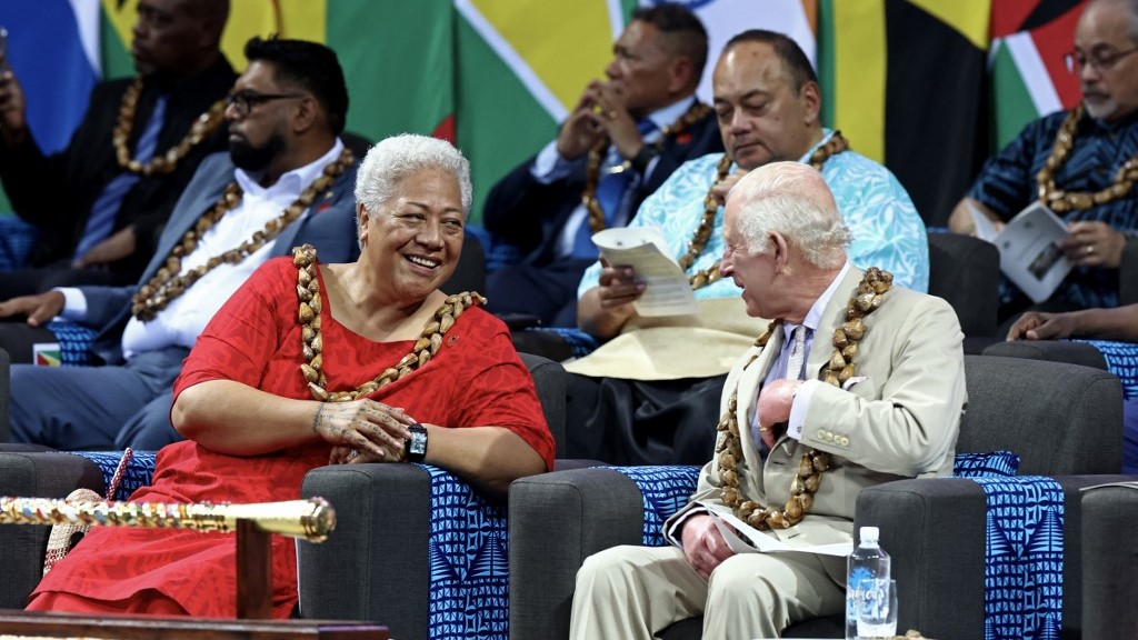 King Charles talks to Samoa's Prime Minister Afioga Fiame Naomi Mata'afa during the opening ceremony for the Commonwealth summit in Apia, Samoa, on 25 October