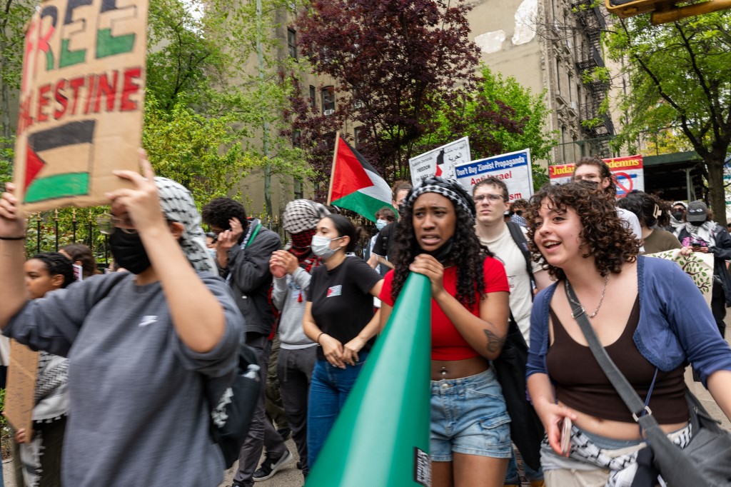 Pro-Palestinian protesters walk from Columbia University down to Hunter College as protests at area universities and colleges continue on May 06, 2024 in New York City. 
