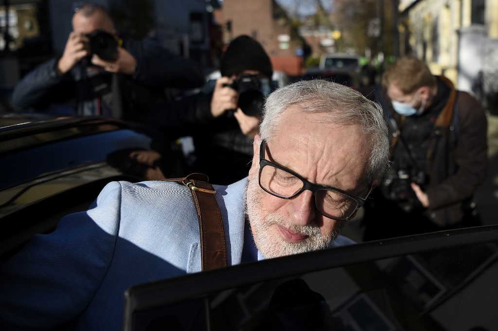 Former Labour leader Jeremy Corbyn leaves his London home on 18 November (AFP)