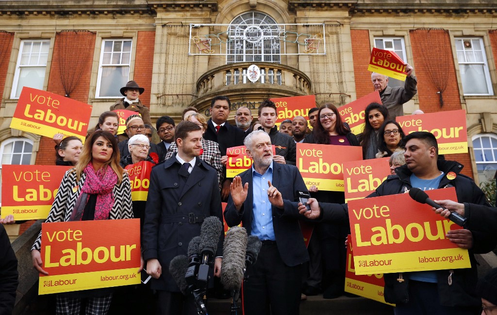 Corbyn speaks outside Chadderton Town Hall in northwest England in 2015 (AFP)