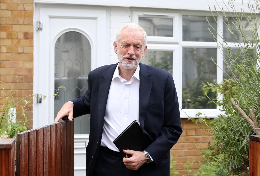 British Labour leader Jeremy Corbyn leaves his house in London on 12 June (AFP)
