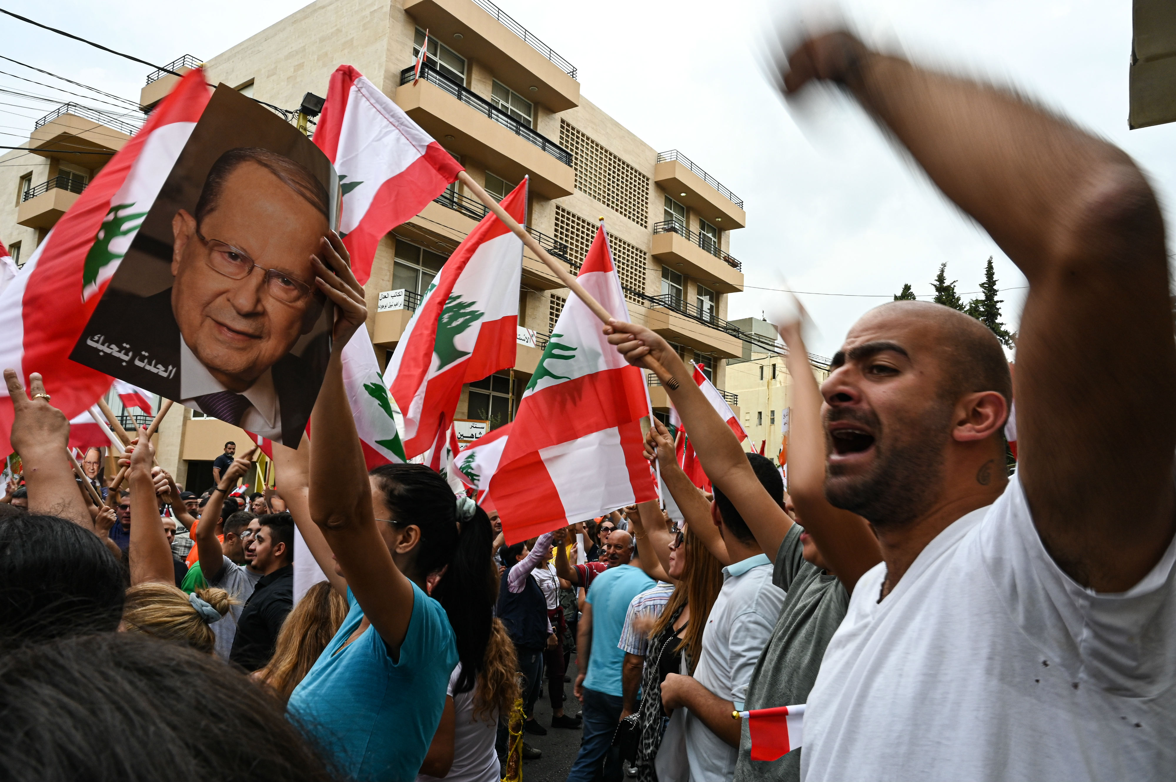 Supporters of Lebanese President Michel Aoun rally in Baabda (MEE/Finbar Anderson)