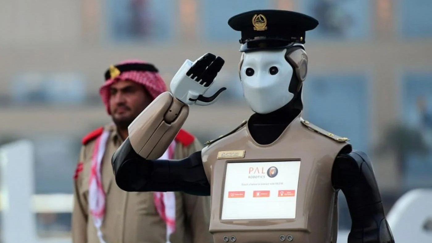 A police robot stands at attention in downtown Dubai in May 2017 (AFP)