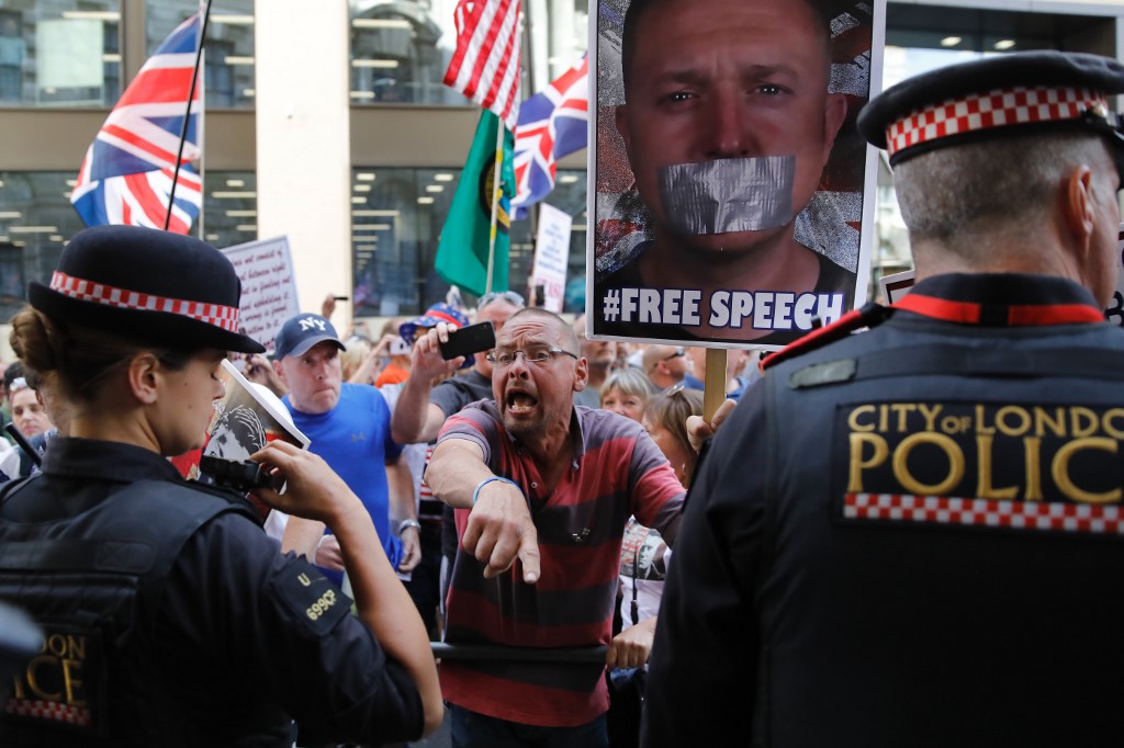 English Defence League supporters rally in central London on 4 July (AFP)