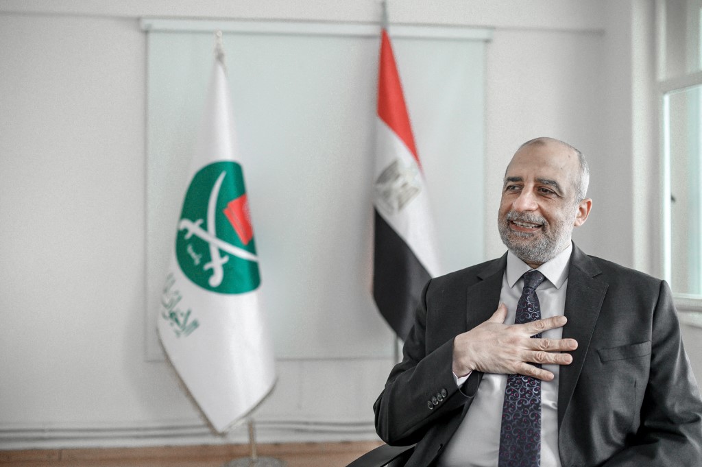 Egypt’s Muslim Brotherhood spokesperson Talaat Fahmy speaks at his office in Istanbul, Turkey, on 19 January 2021 (AFP)