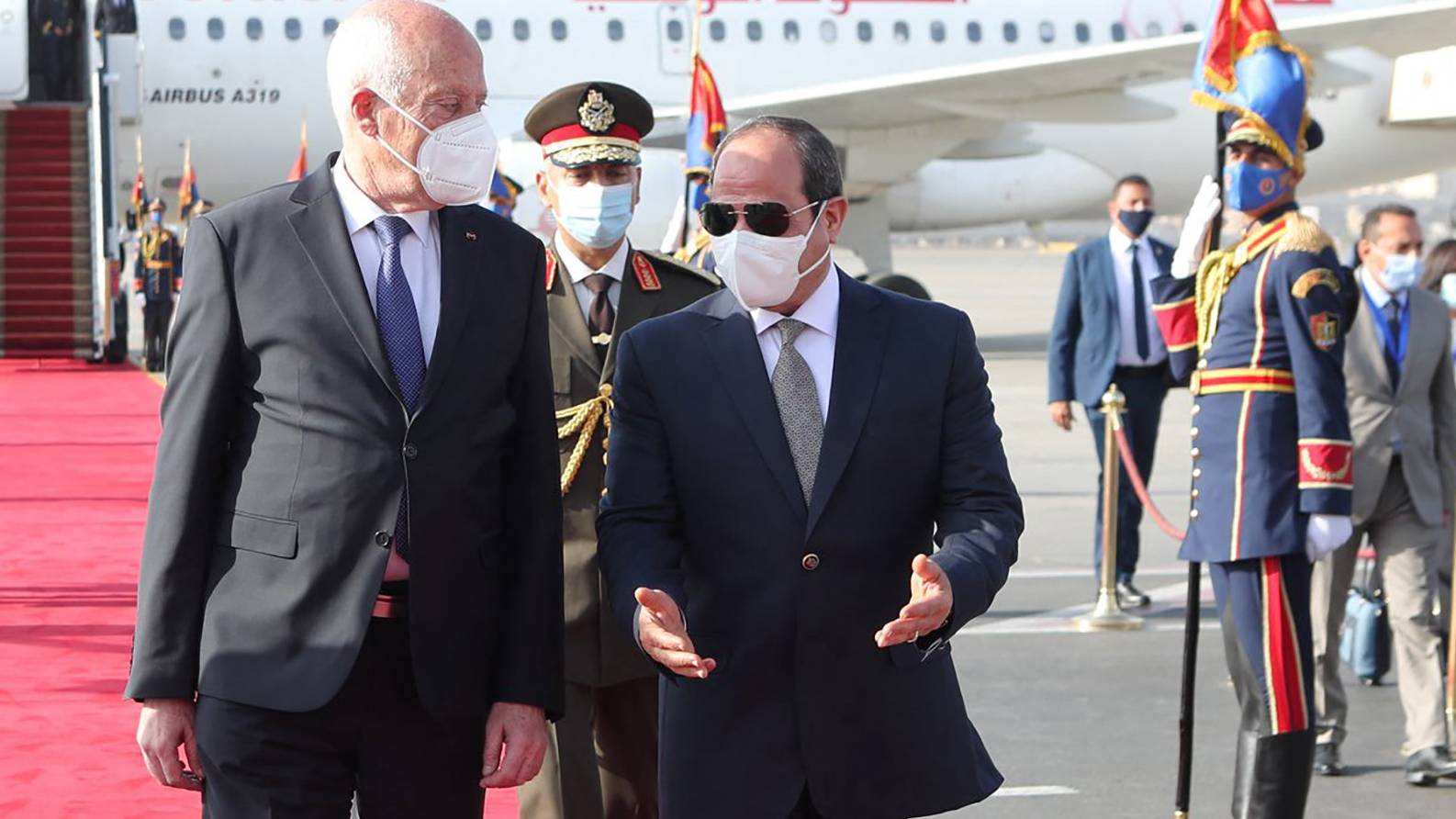 Tunisian President Kais Saied (L) being welcomed by Egyptian President Abdel Fattah el sisi on 9 April 2021 (AFP)