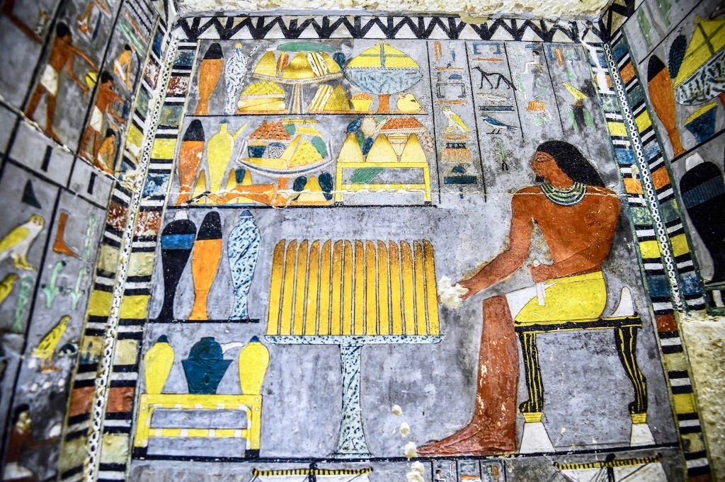 Tomb owner Khoy depicted sitting at offerings table (AFP)