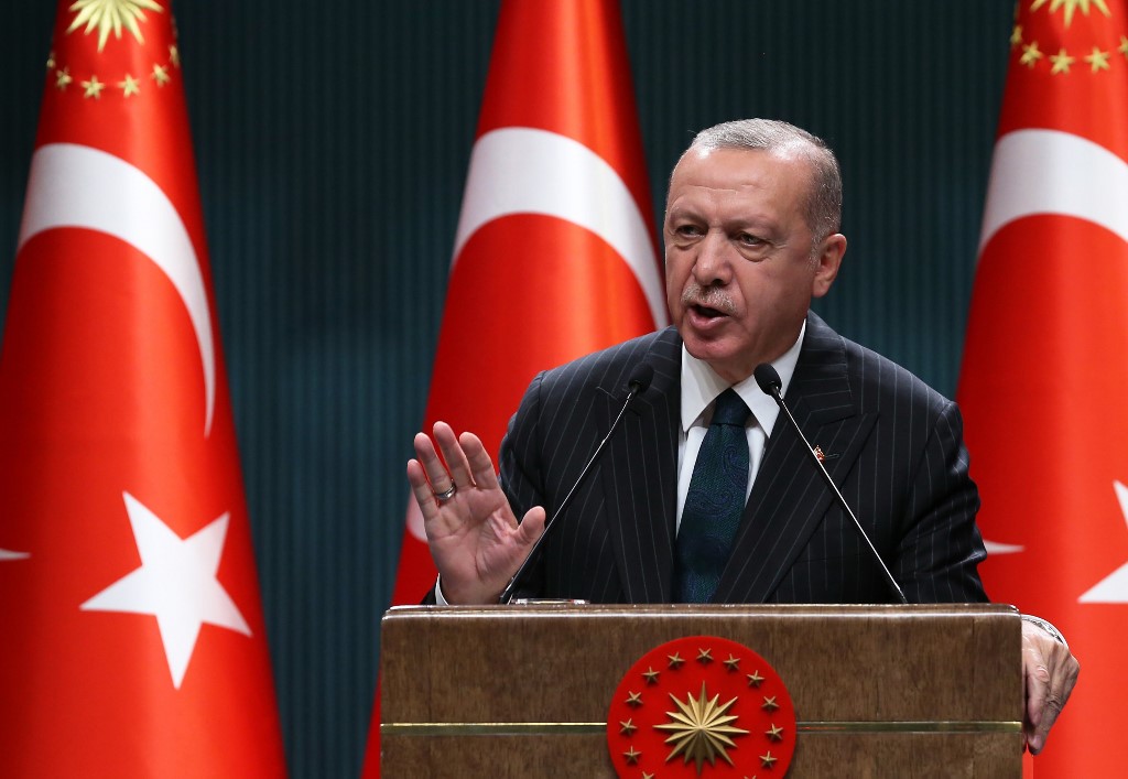 Turkish President Recep Tayyip Erdogan speaks in Ankara on 24 August (AFP)