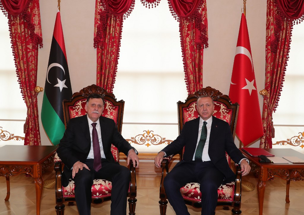 Turkish President Recep Tayyip Erdogan meets GNA leader Fayez al-Sarraj in Istanbul on 12 January (Mustafa Kamaci/Turkish Presidential Press Service/AFP)