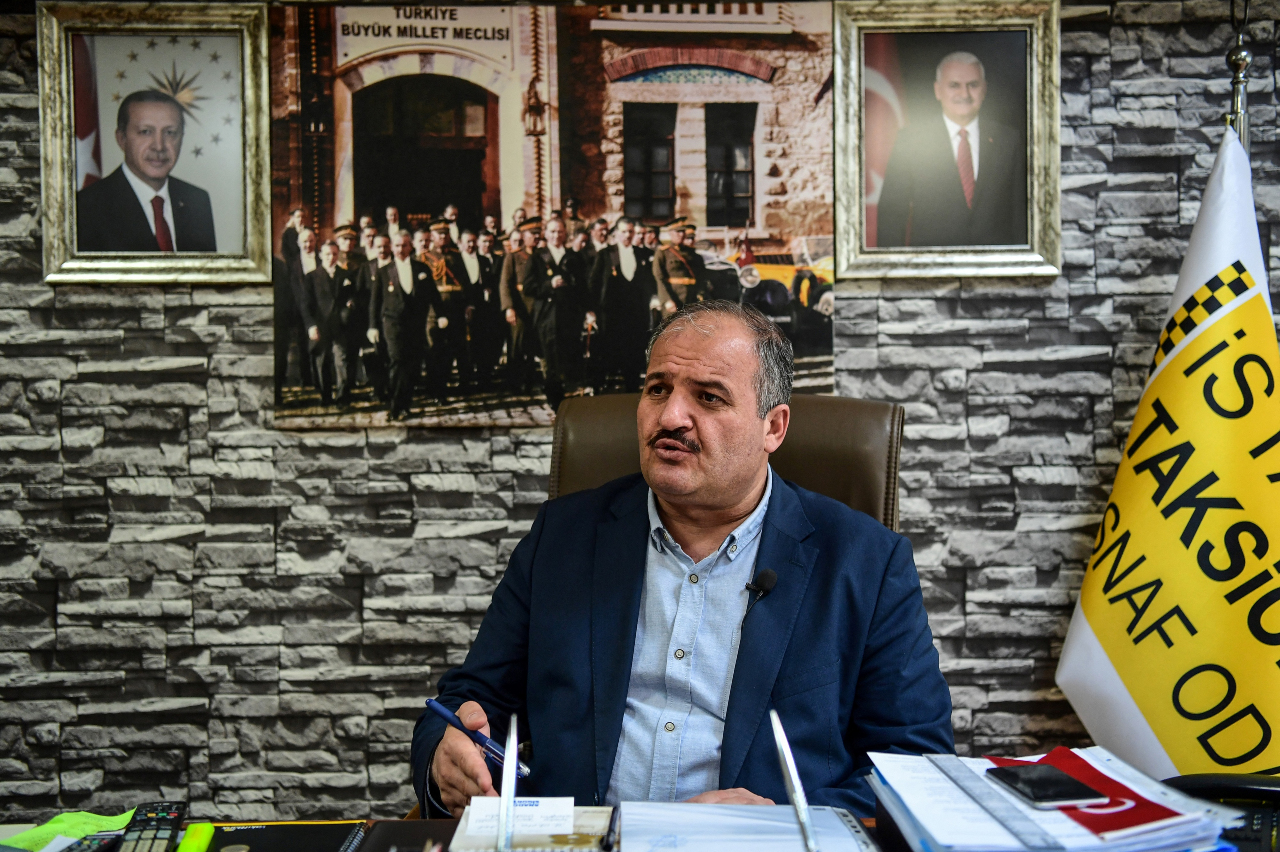 Eyup Aksu, head of the Istanbul Taxi Drivers Chamber, said: 'We need technology to connect customers with available taxis' (AFP)