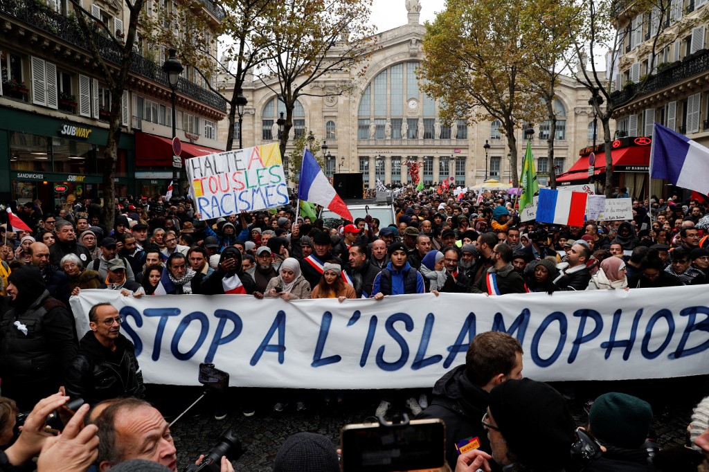 People demonstrate against Islamophobia in Paris on 10 November (AFP)