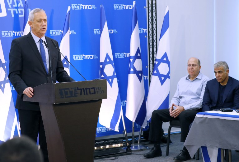 Benny Gantz of the Blue and White alliance speaks in Tel Aviv on 20 March (AFP)