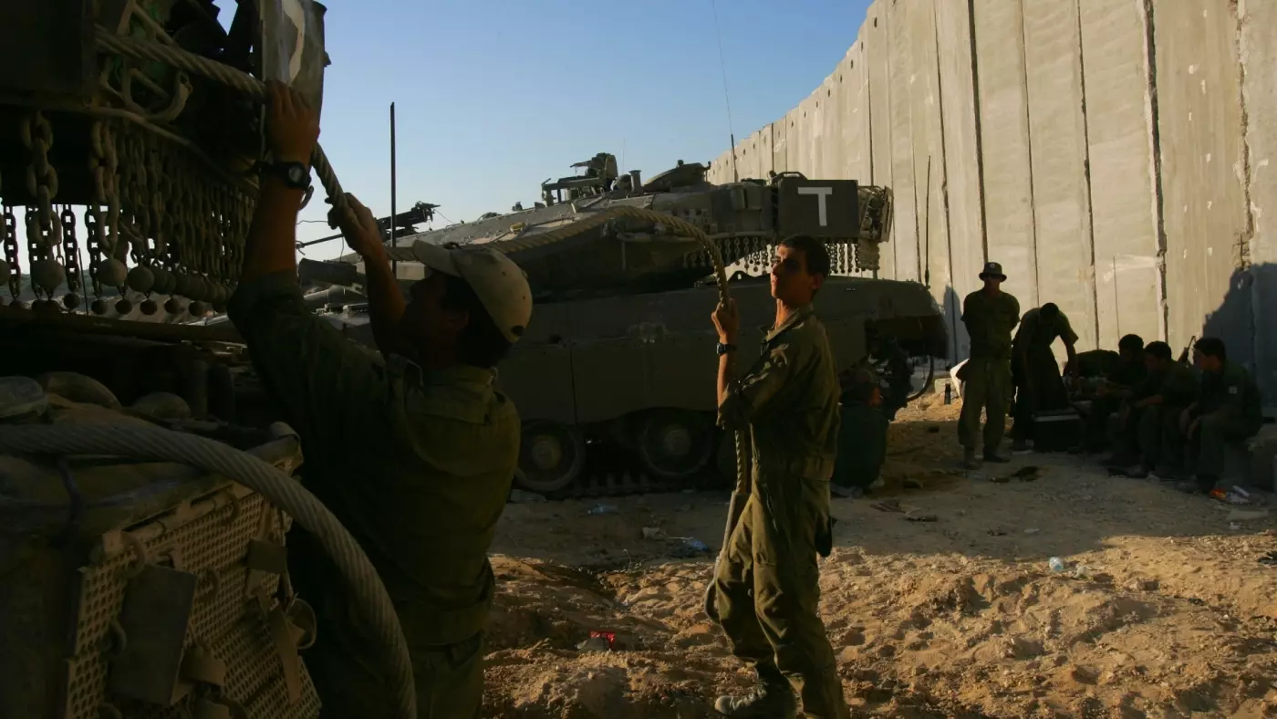 Israeli soldiers wait for orders to withdraw from the Philadelphi Corridor on the Egyptian border in the southern Gaza Strip in 2005 (Reuters/David Silverman)