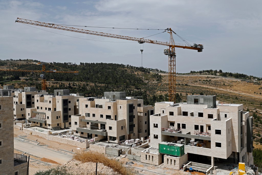 Buildings are under construction in the Jewish settlement of Gilo on 6 June (AFP)