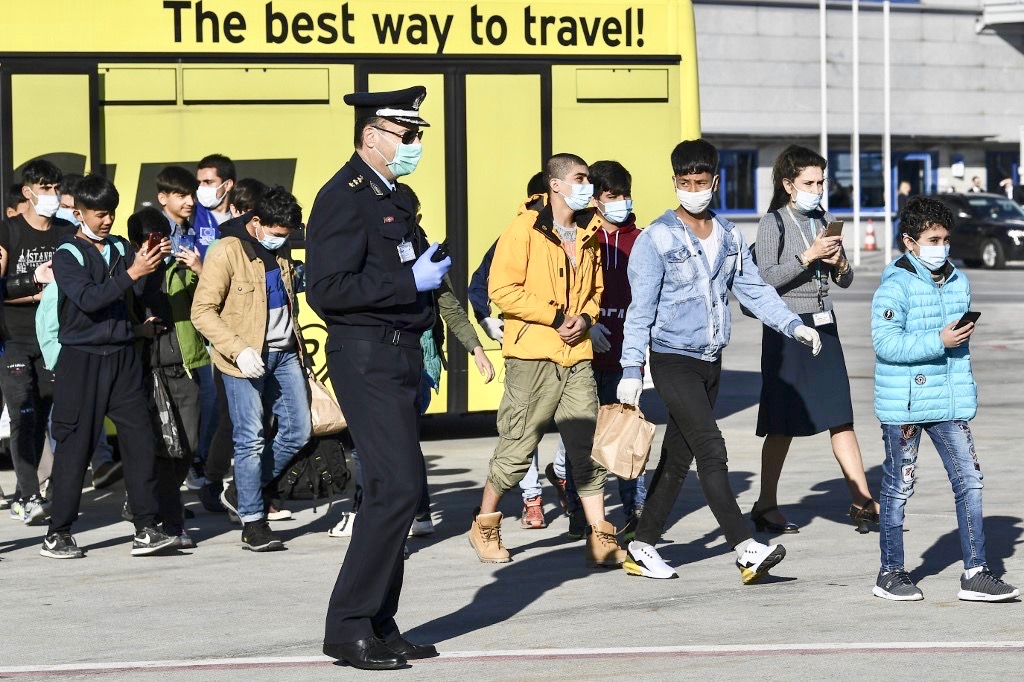 Group of 47 unaccompanied children prepare to leave for Germany from Athens airport on Saturday (AFP)