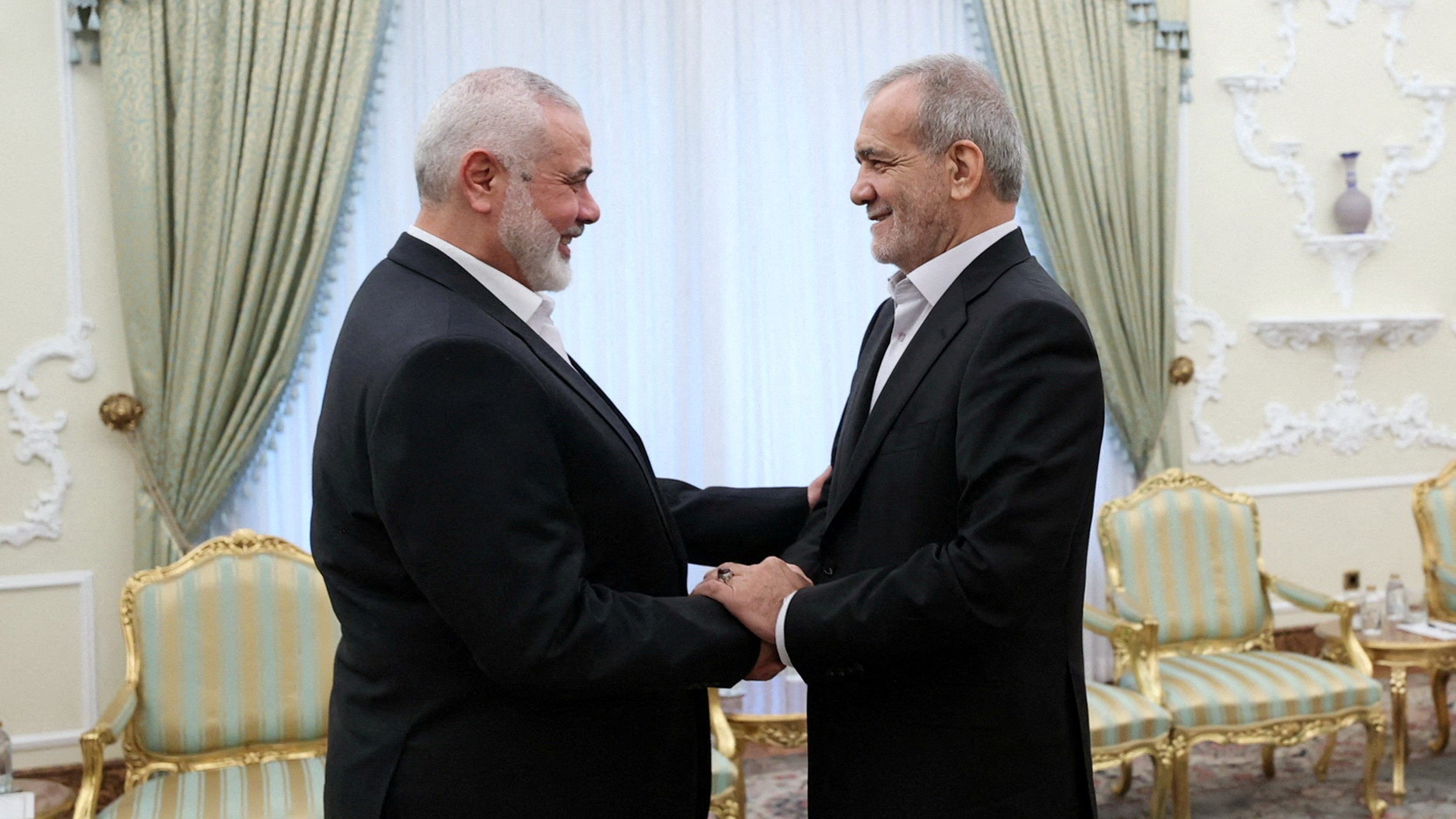 ranian President Masoud Pezeshkian meets with Ismail Haniyeh in Tehran, 30 July (Reuters/Iran's Presidency/WANA)