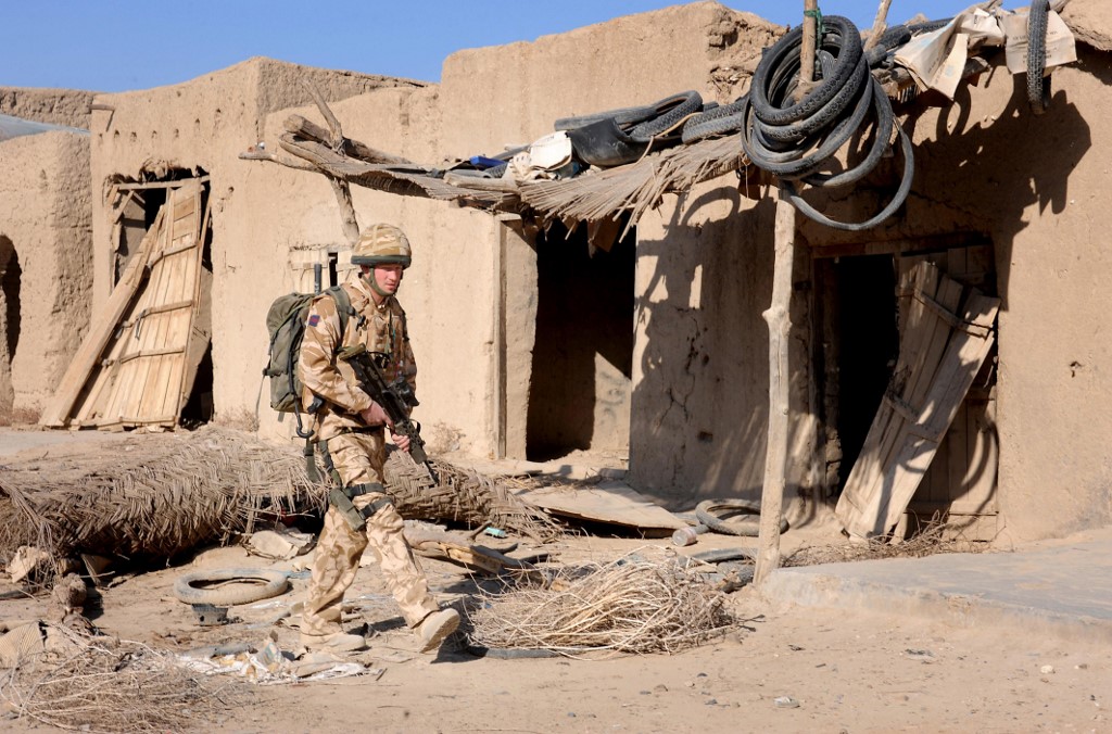 Prince Harry patrols a town in southern Afghanistan in 2008 (AFP)