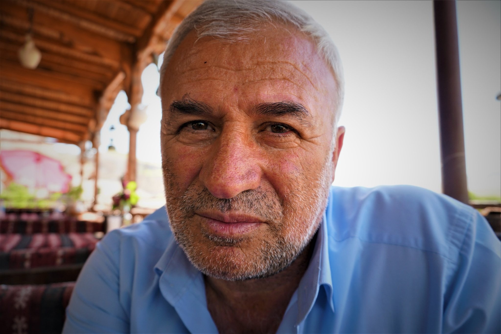 Ahmet Akdeniz used to defend the dam project as a way out of poverty and neglect for Hasankeyf residents (MEE/Nimet Kirac)