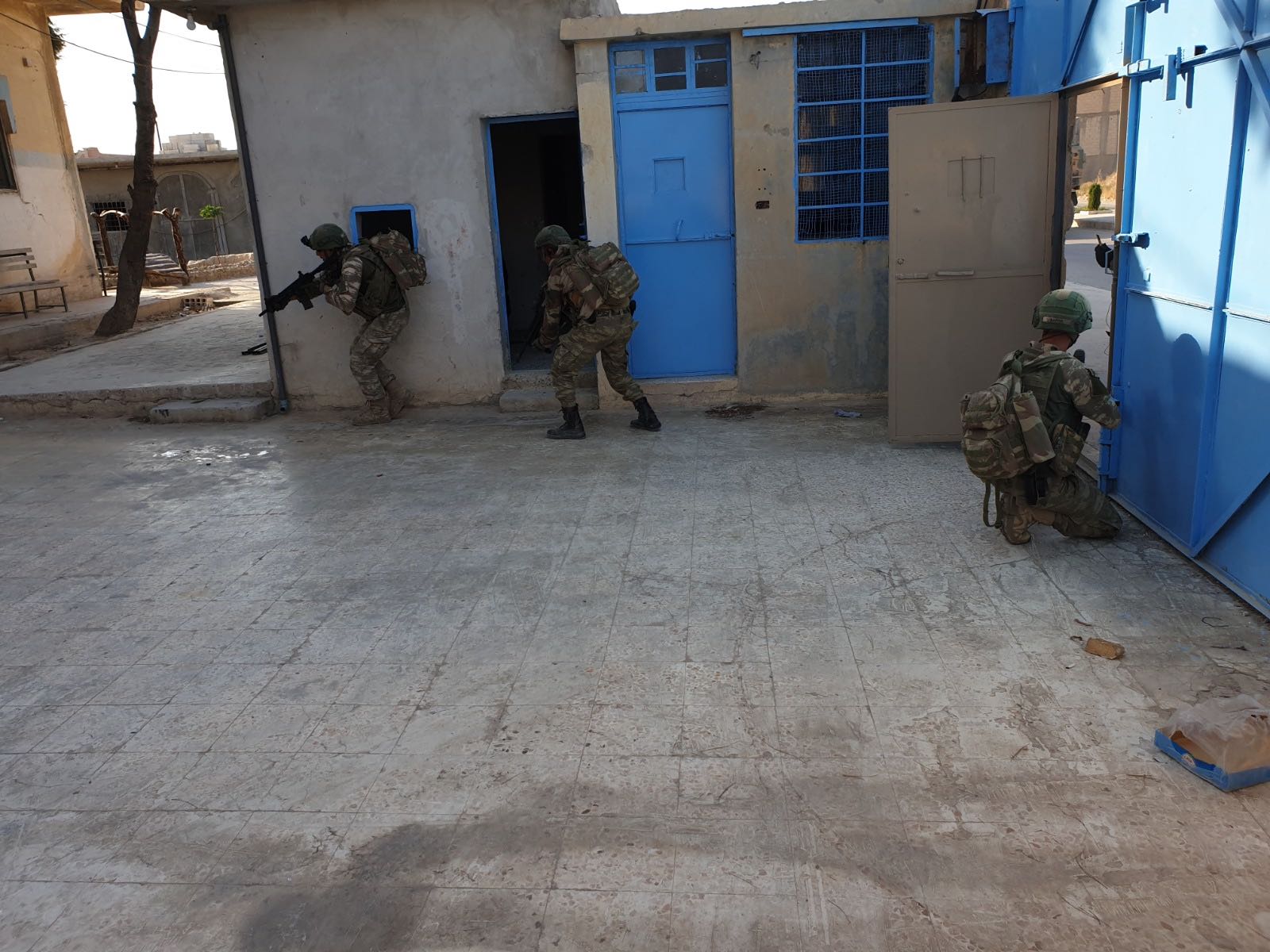 Turkish forces raiding an empty prison in Syria's Tal Abyad (Supplied)