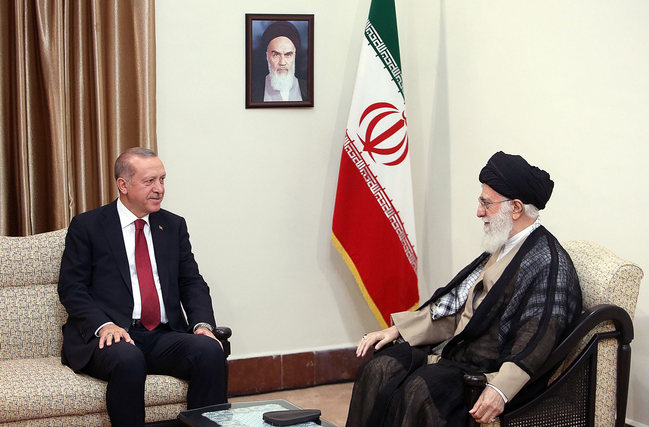 Iranian supreme leader Ayatollah Ali Khamenei (R) talking with Turkish president Recep Tayyip Erdogan during a meeting in Tehran in 2017 (AFP)