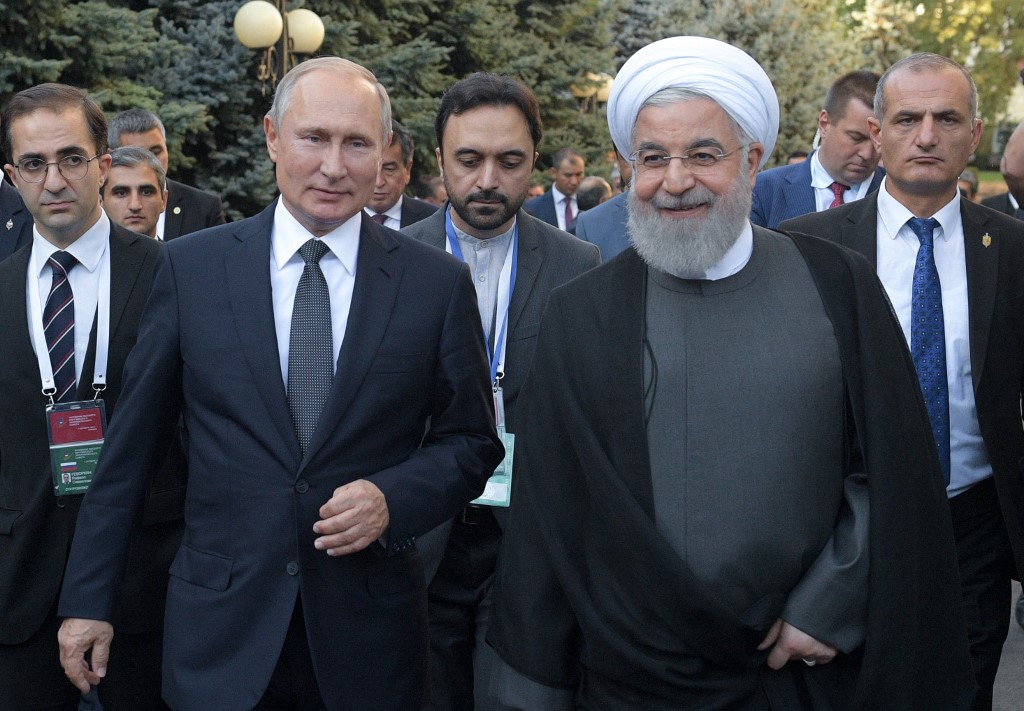 Rouhani meeting with Russian President Vladimir Putin attending a meeting of the Supreme Eurasian Economic Council in Yerevan on October 1, 2019 (AFP)