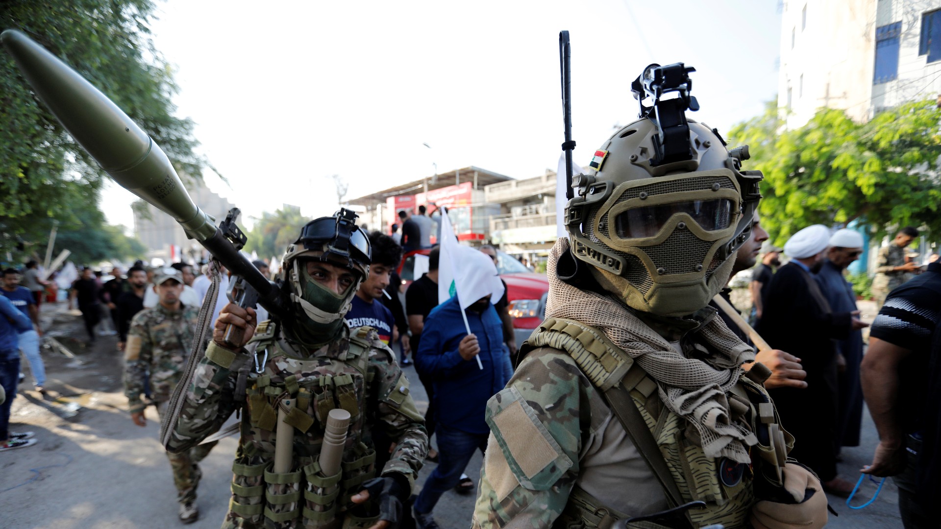 Iraqi Popular Mobilisation Forces (Hashd al-Shaabi) are seen at a march in Baghdad in 2019 (Reuters)