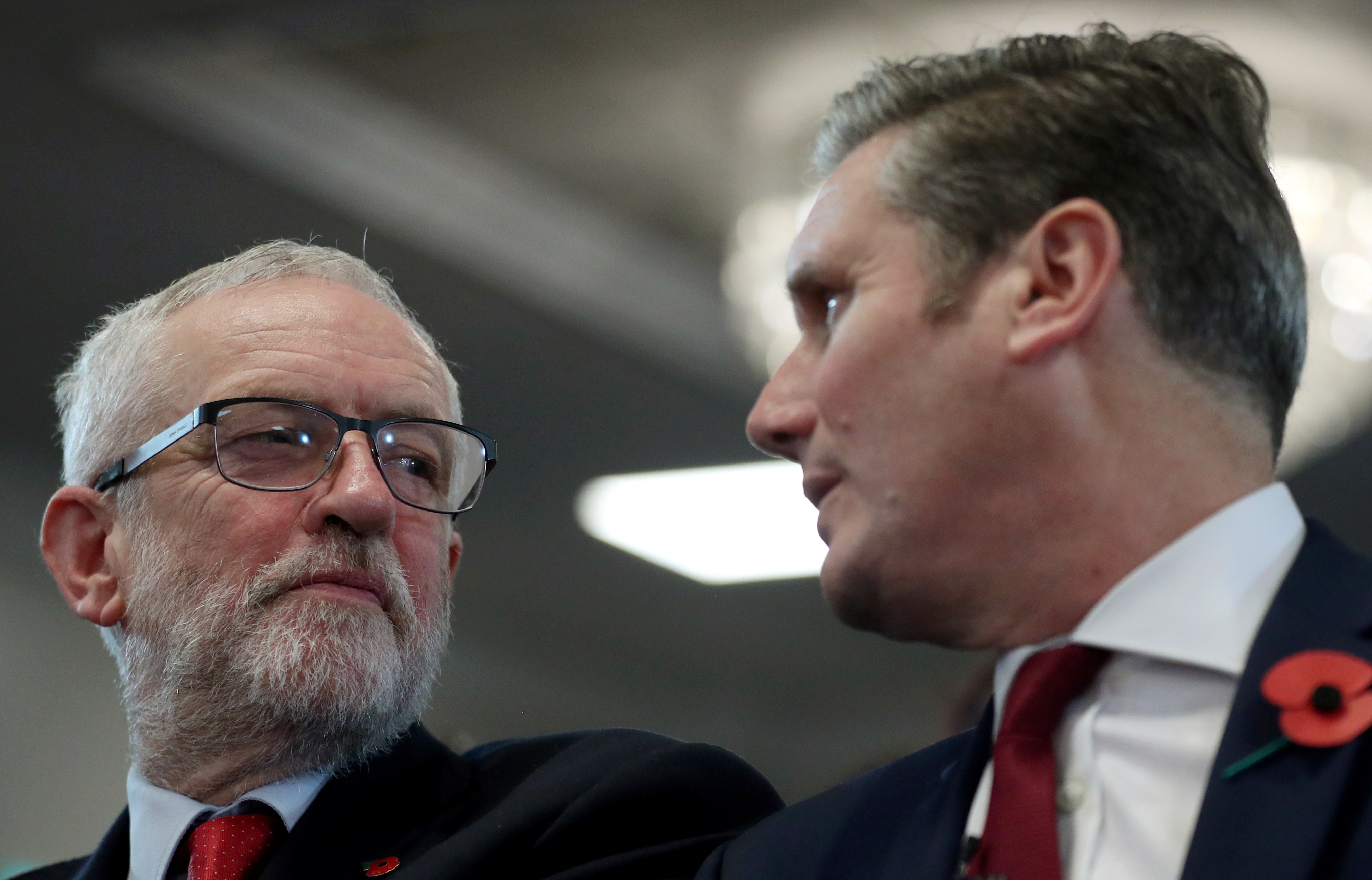 Former Labour leader Jeremy Corbyn and current leader Keir Starmer during a general election campaign meeting in Harlow, UK on 5 November 2019 (Reuters)