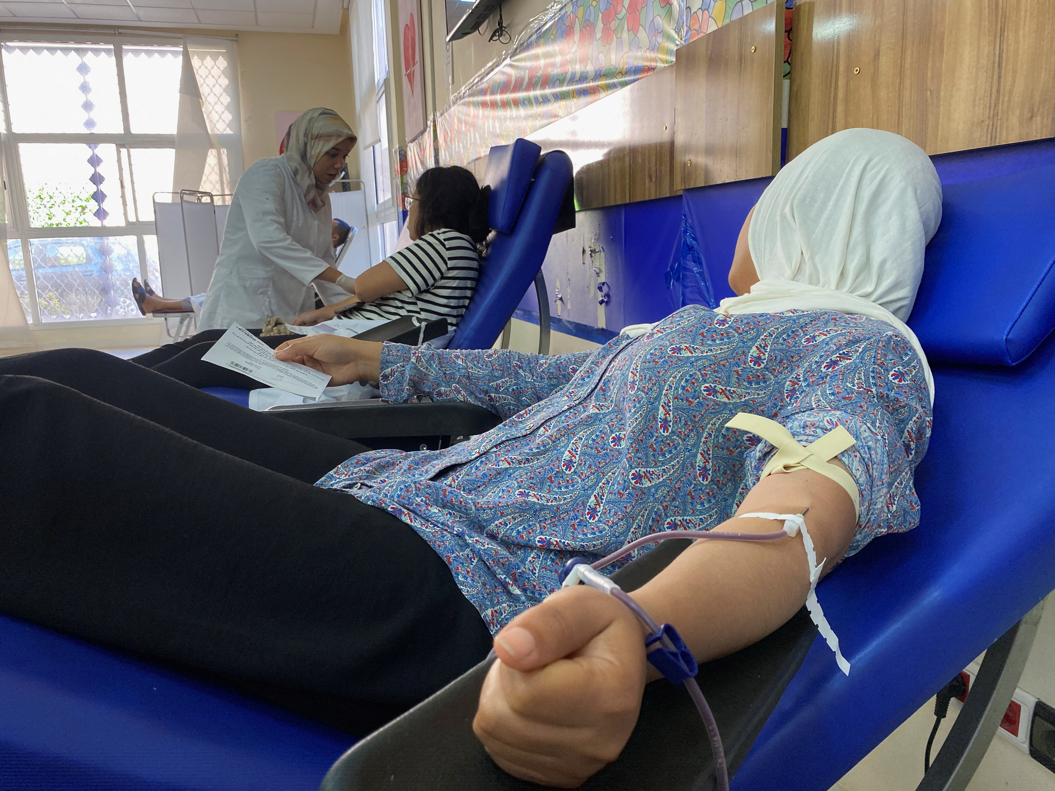 People donate blood following a powerful earthquake, in the historic city of Marrakech, in Morocco, September 9, 2023 (Reuters/Abdelhak Balhaki)