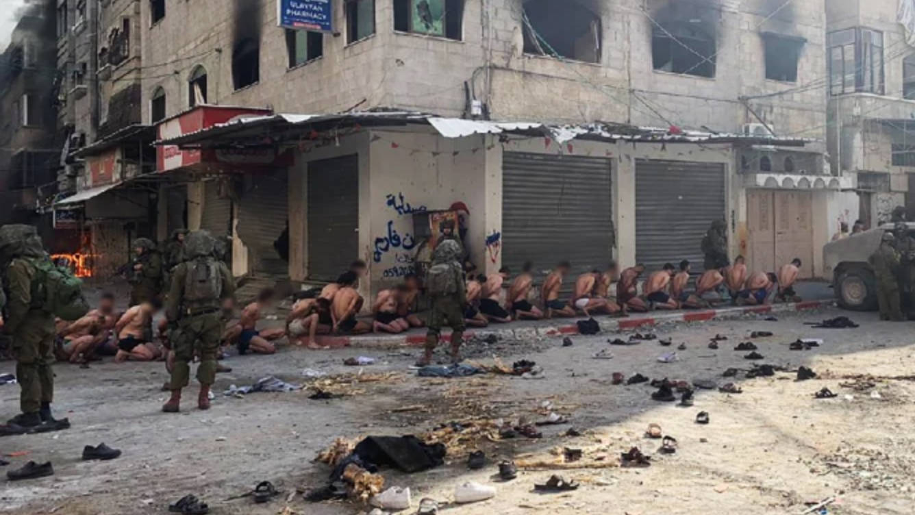 alestinian men rounded up and stripped by Israeli forces in Gaza seen in a video released on 7 December (Screengrab/X)