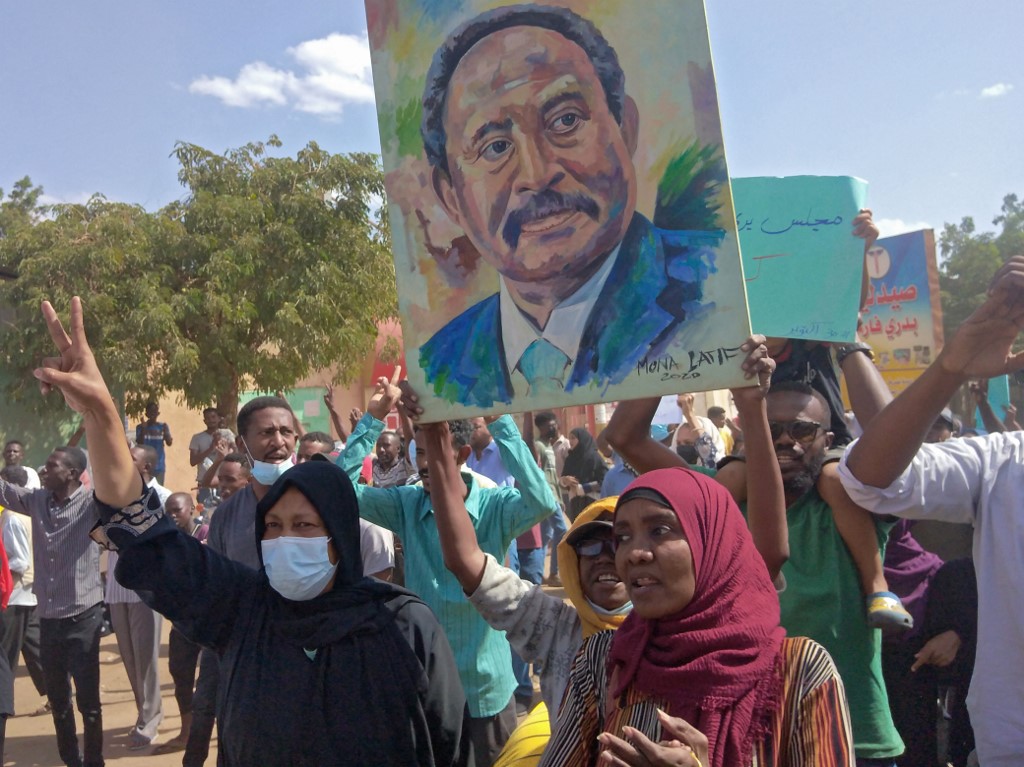 Hamdok was seen as some Sudanese as a democratic hope. Others say he ended up being the civilian face of a military coup (AFP)