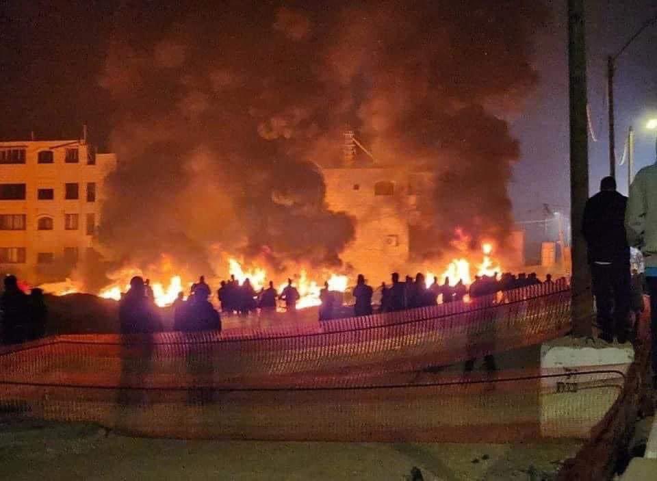 An image shared on Twitter of the chaotic scene in the northern West Bank town of Hawara during an attack organised by Israeli settlers following an earlier fatal shooting (Twitter)