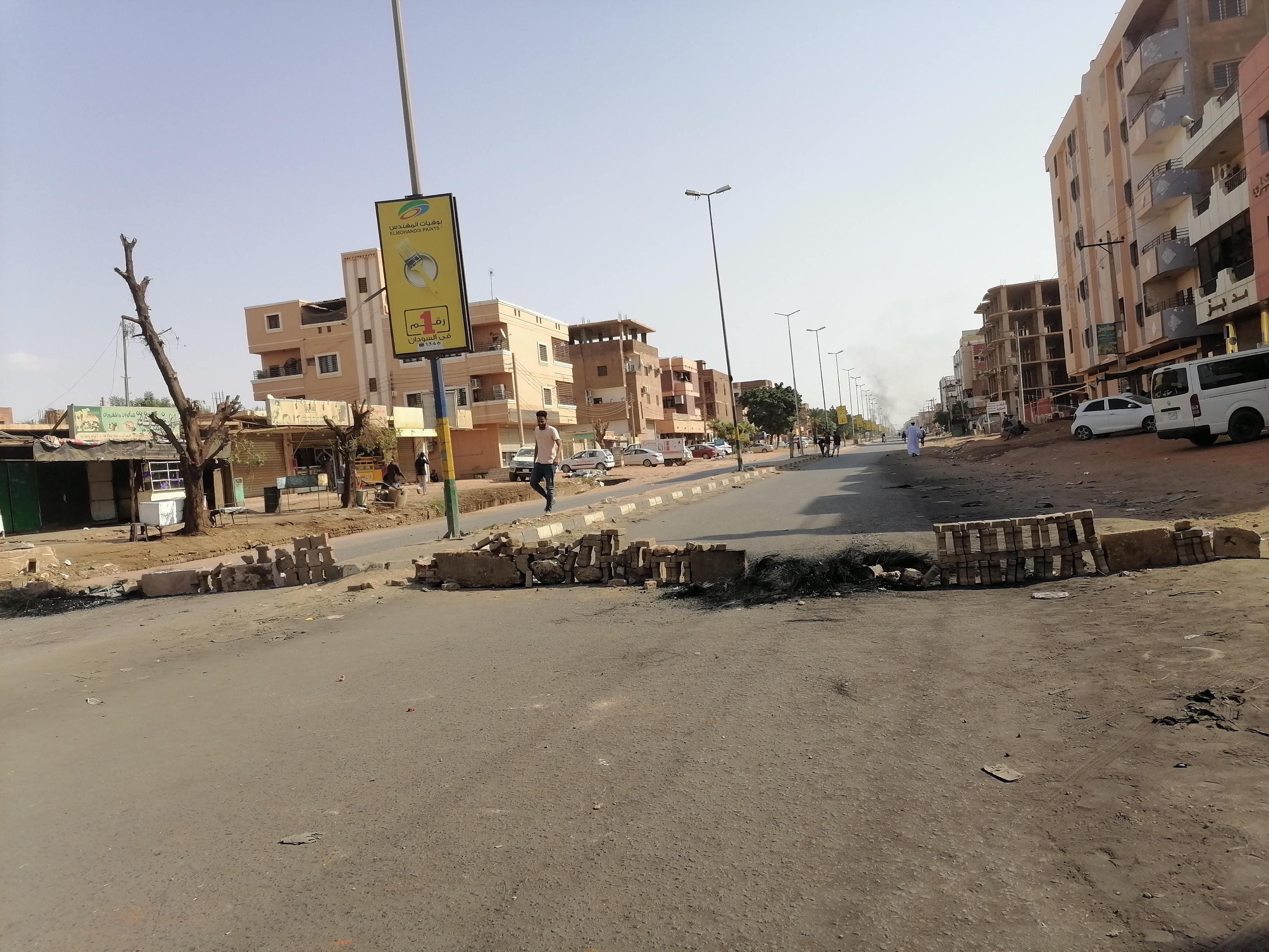 A street in Khartoum with a barricades built by protesters (MEE/Mohamed Amin)