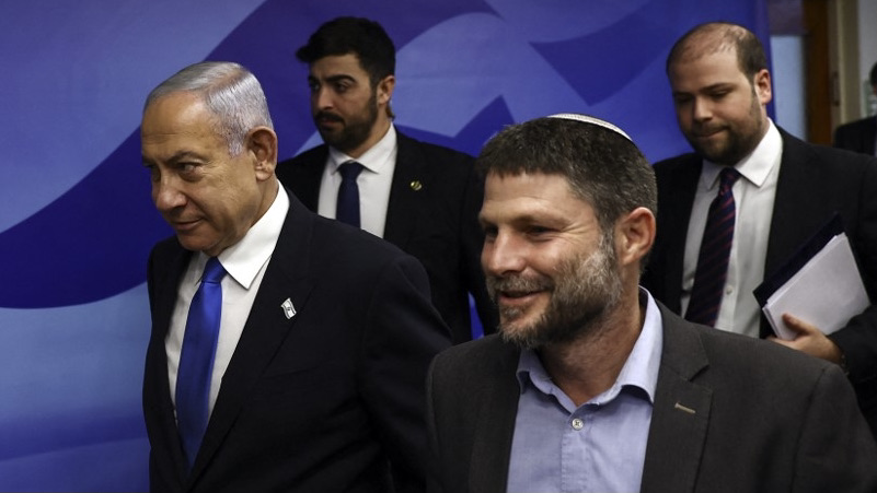 Israeli Prime Minister Benjamin Netanyahu (L) and Finance Minister Bezalel Smotrich arrive to attend a cabinet meeting at the prime minister's office in Jerusalem, on February 23, 2023. AFP 2.jpg