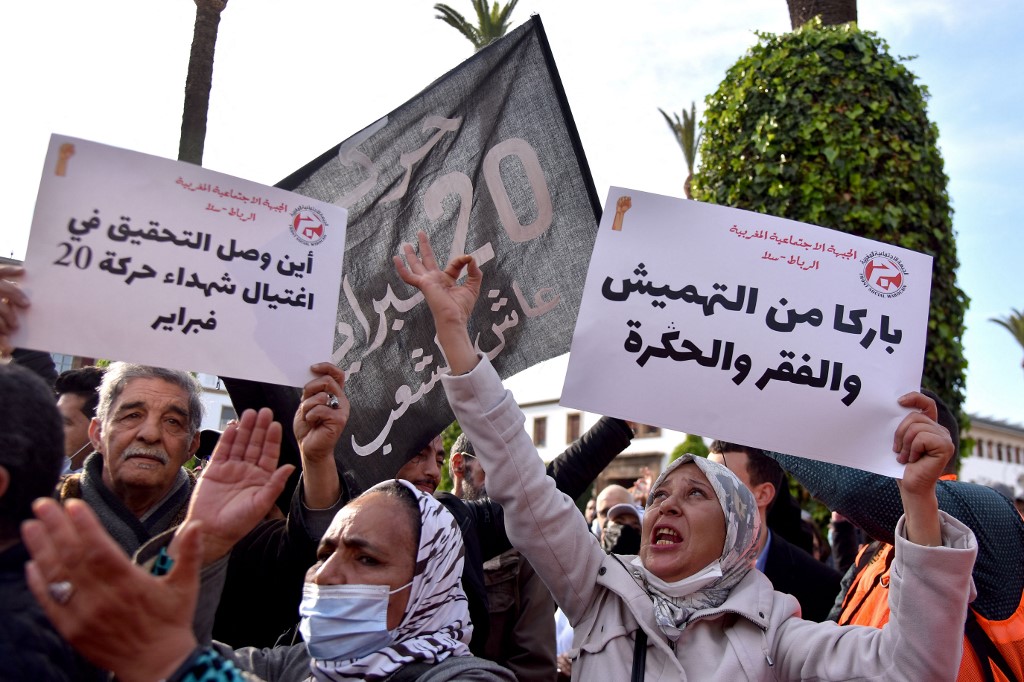 Moroccans gather in front of parliament in the capital Rabat to protest against rising prices, 20 February 2022 (AFP)