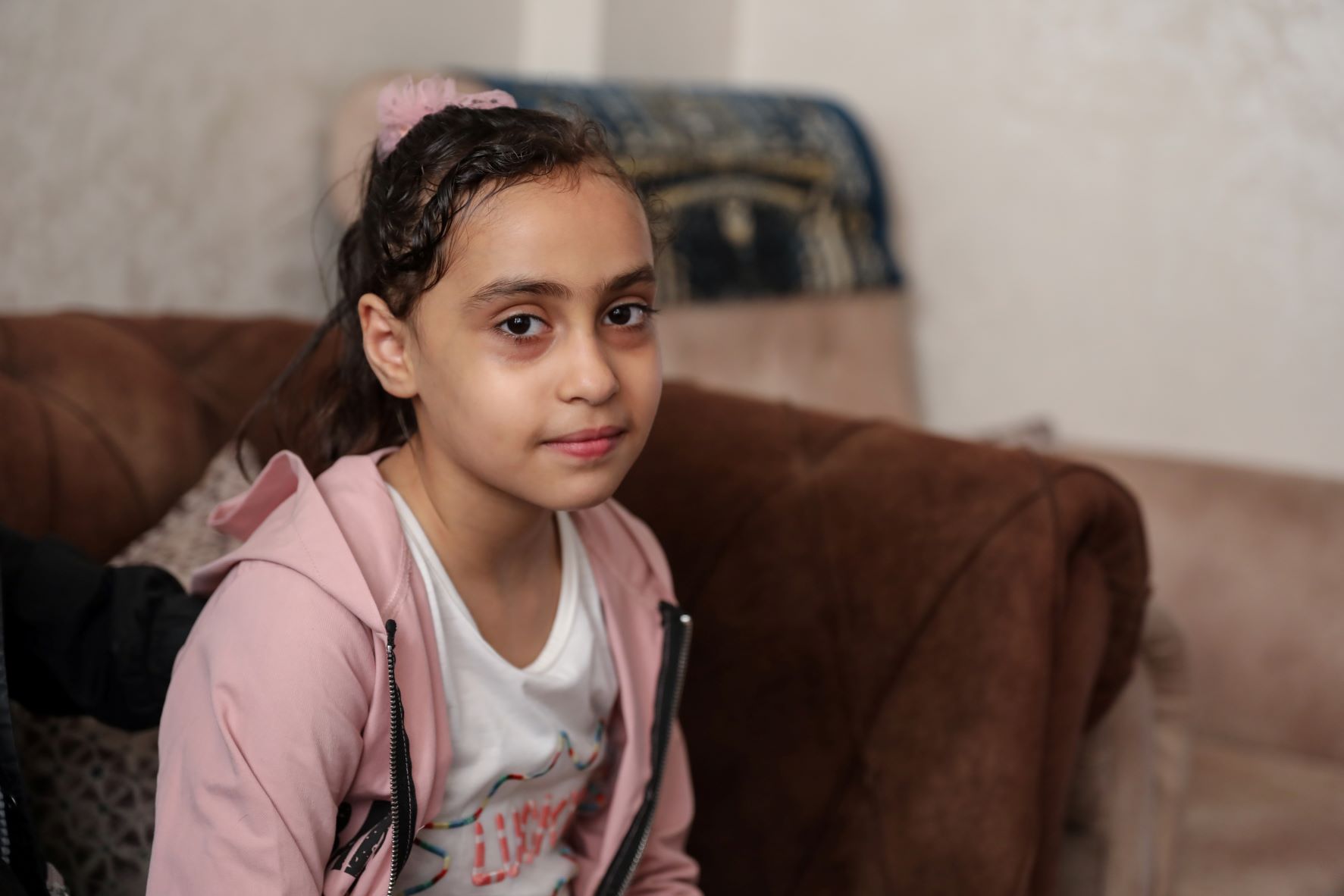 Suzi Eshkuntana, only survivor along with her father from an air strike that flattened her home in the al-Wehda street in the middle of Gaza (MEE/Maha Husseini)