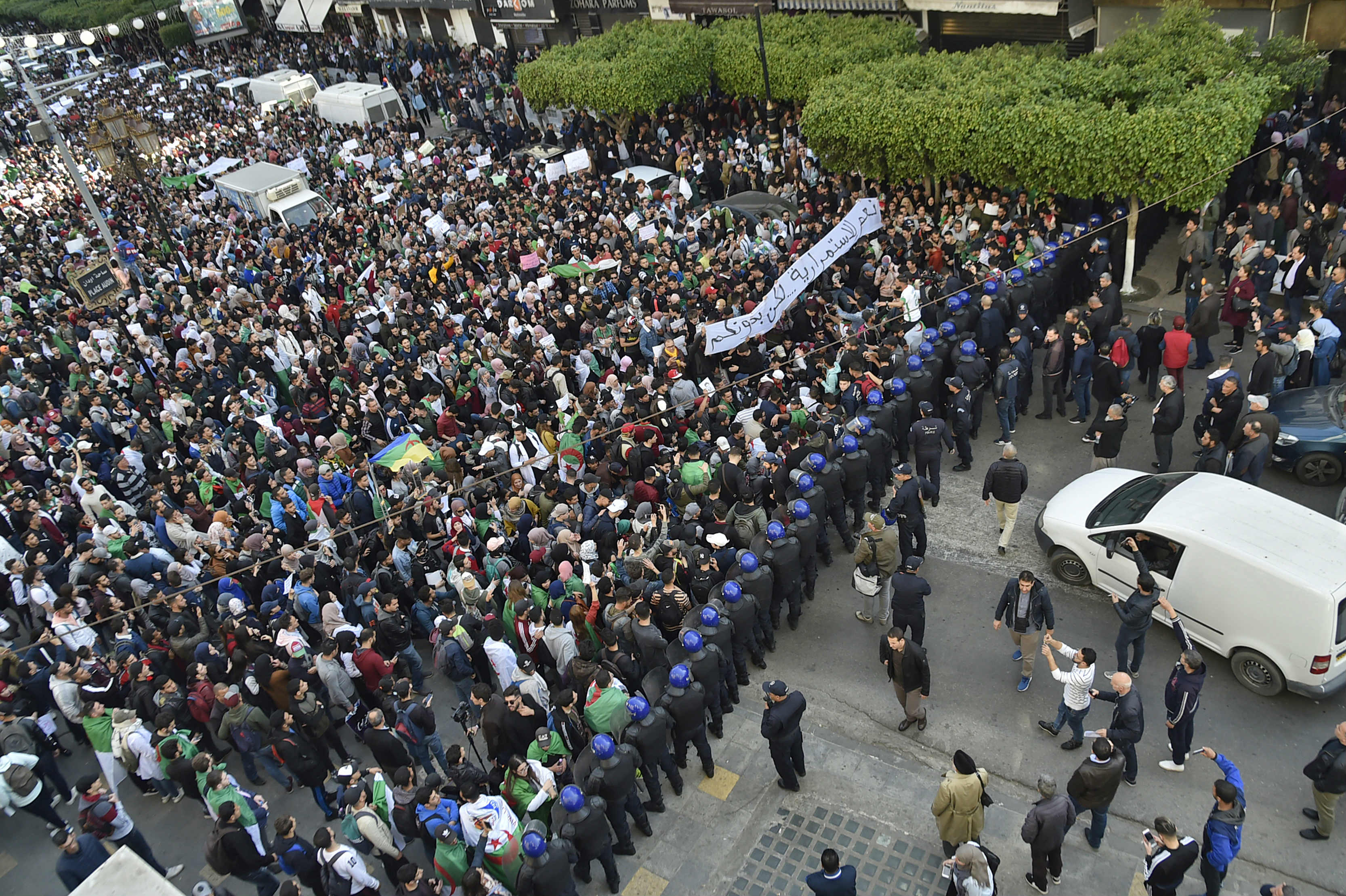 Thousands of people have taken to the streets of the capital Algiers (AFP)