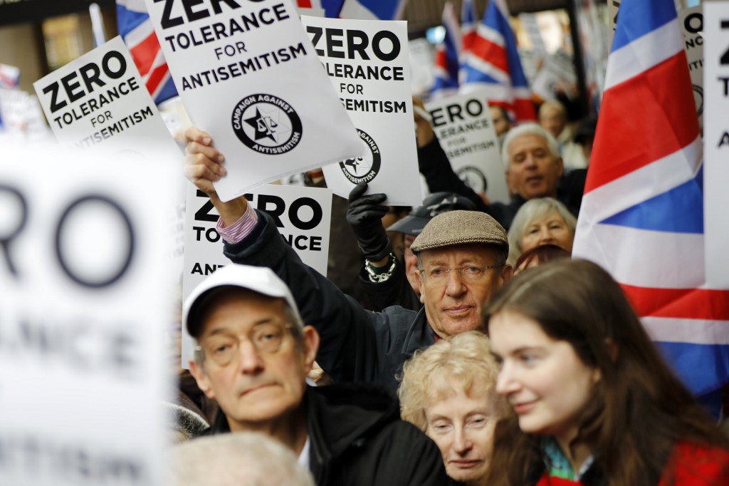 Protesters rally against antisemitism in London in 2018 (AFP)