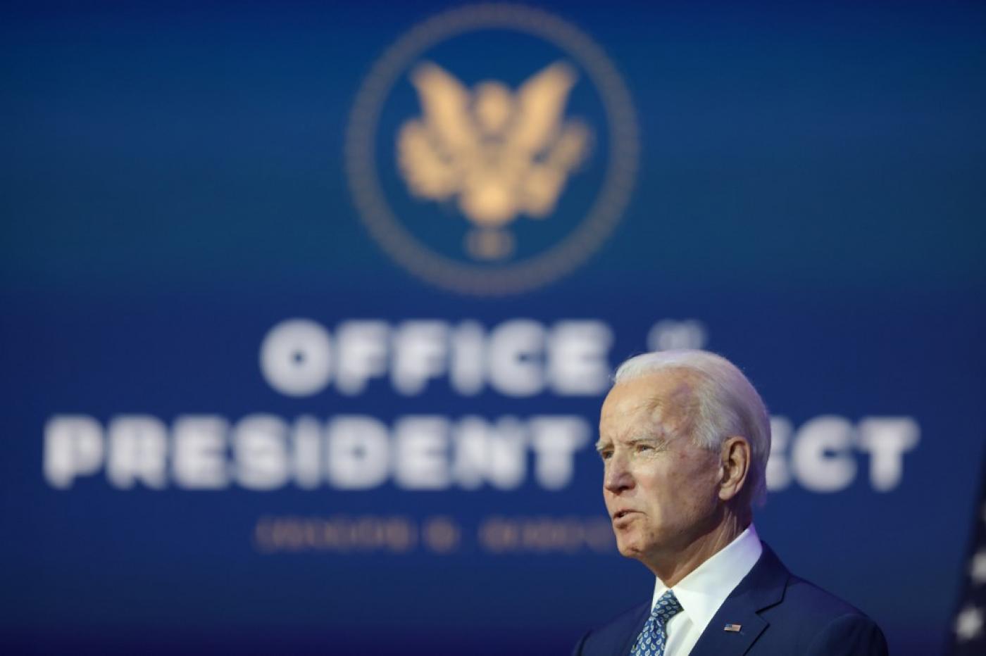 US president-elect Joe Biden speaks to the media in Delaware on 9 November (AFP)