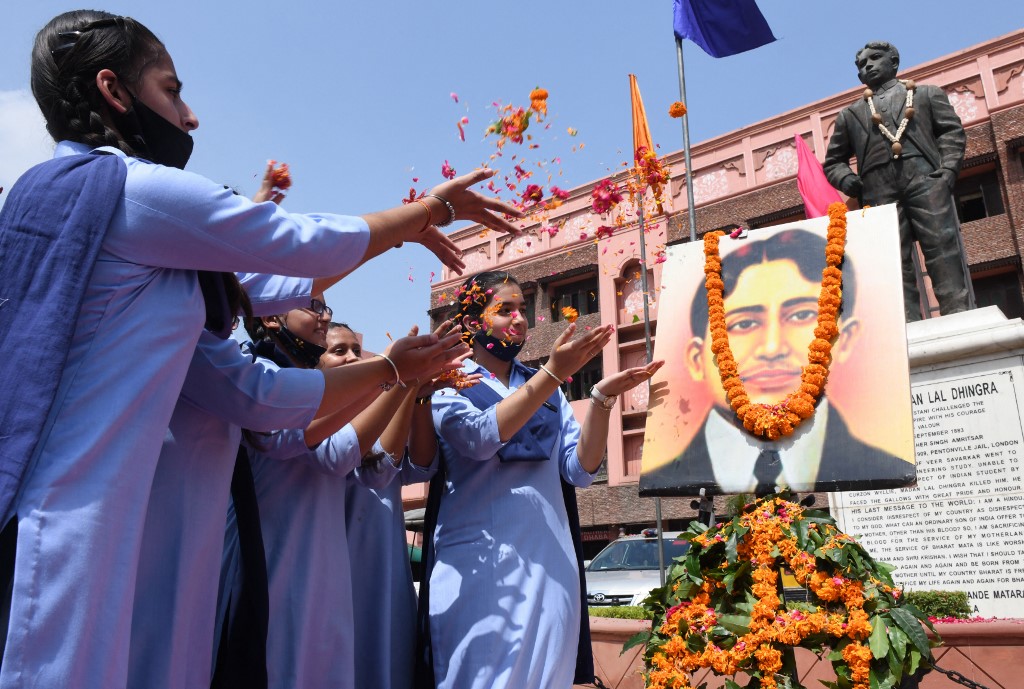 Students pay tribute to revolutionary leader Madan Lal Dhingra more than a century after his execution in Amritsar, India, on 17 August 2021 (AFP)