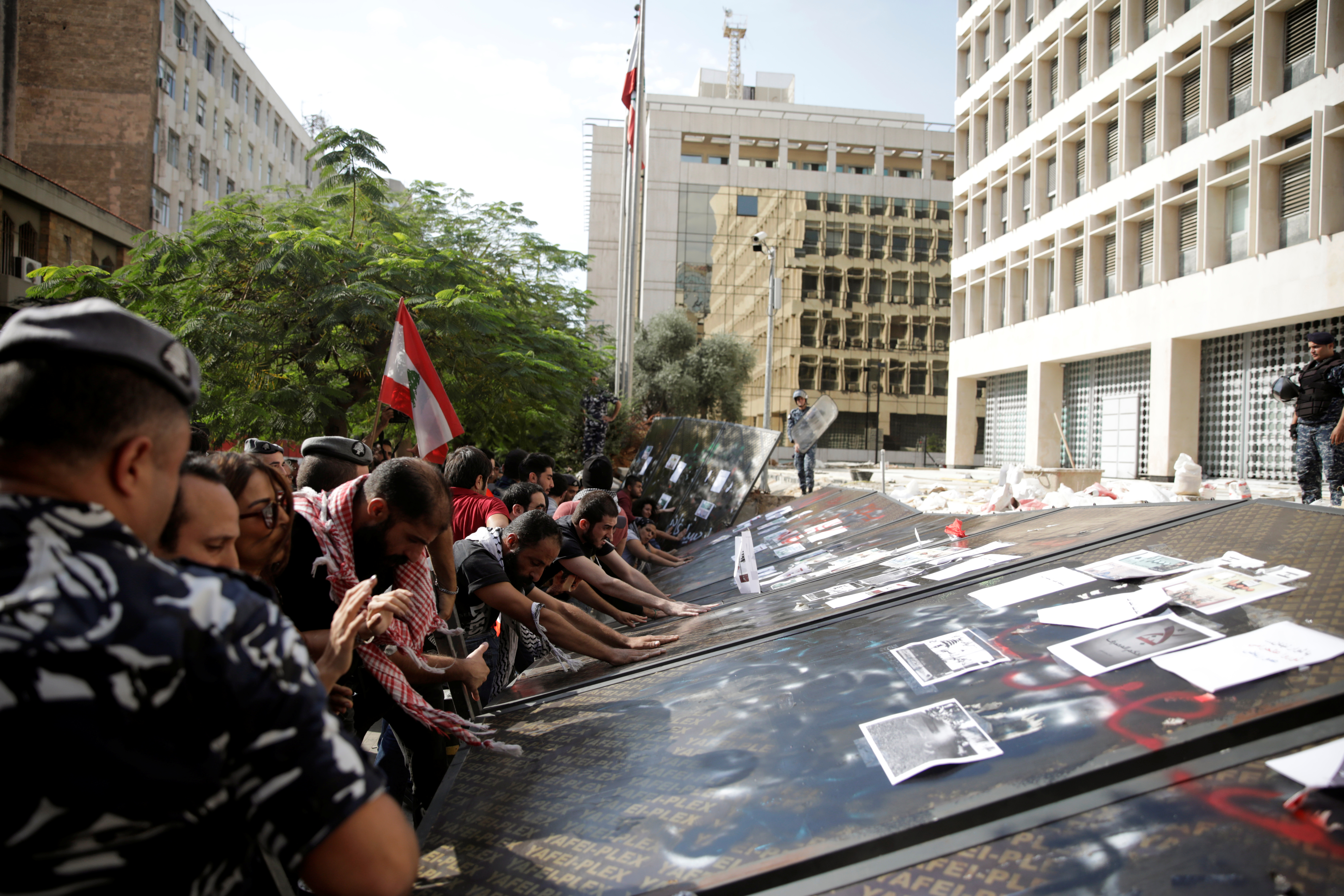 Protesters gather outside Lebanon’s central bank in Beirut in 2019 (Reuters)